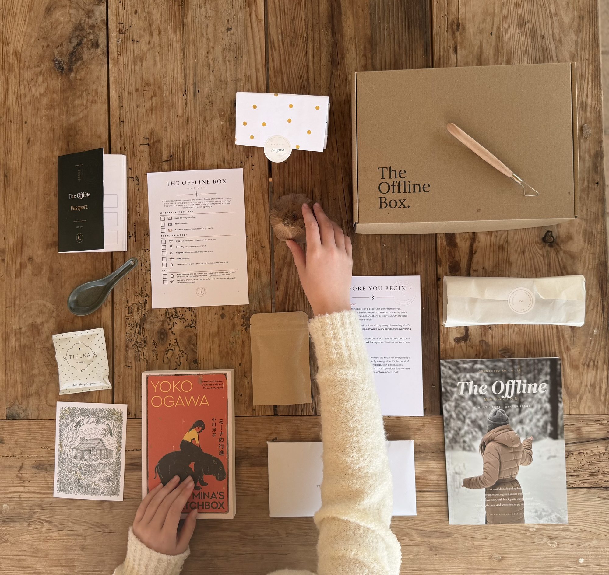 An Offline Box laid out on a timber table